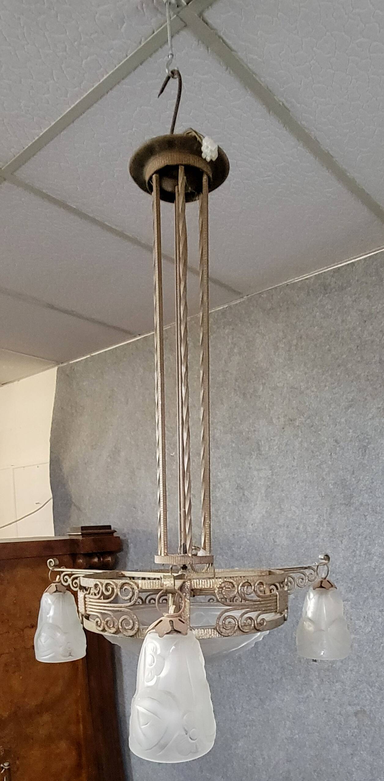 Large Art Deco chandelier, made of finely wrought wrought iron.