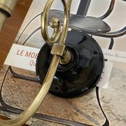 Pair of wall sconces in brass with square tulip glass shades.
