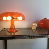 Orange nessino pose lamp for artemide by giancarlo mattioli