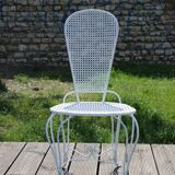 Two small wrought iron chairs