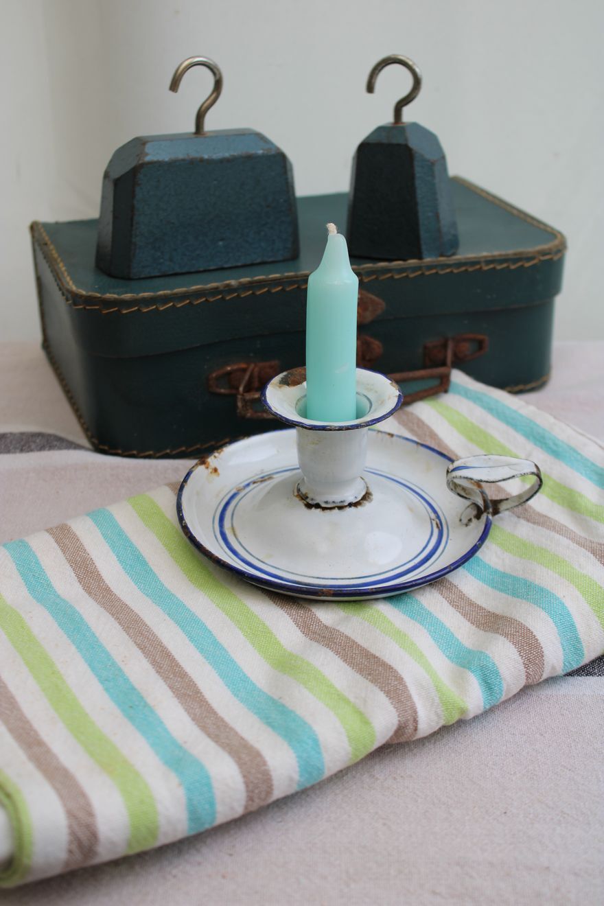 Old enamel candle holder