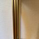 Regency style console table, in gilded metal and smoked glass