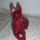 Saint Clement. Dog lying in earthenware
