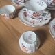 5 tea cups with saucers and 2 small pots, made in England.