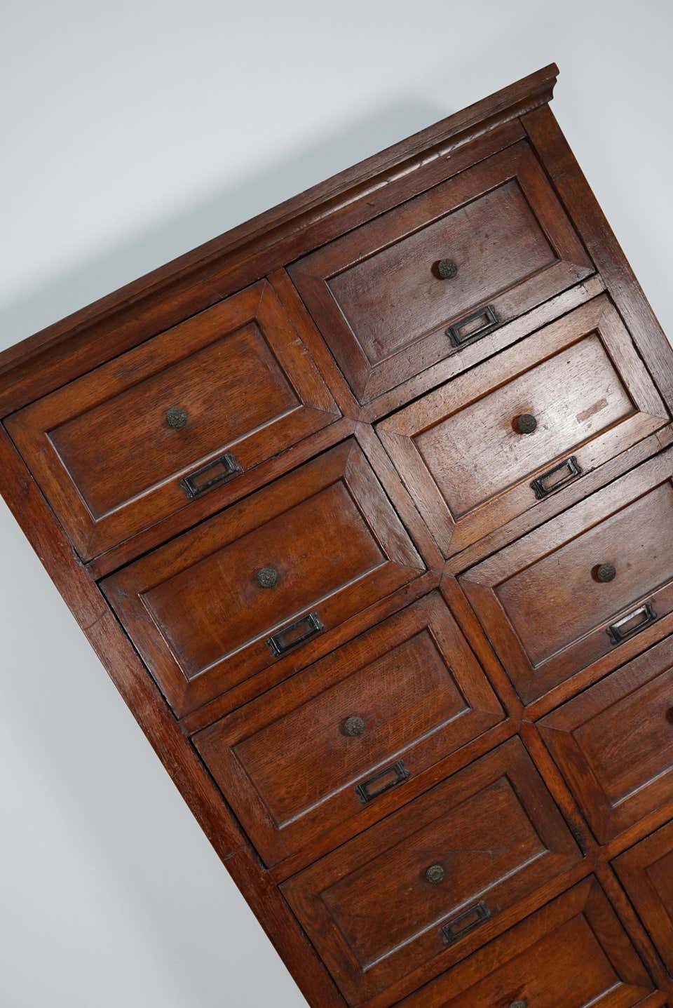 1870s oak apothecary cabinet