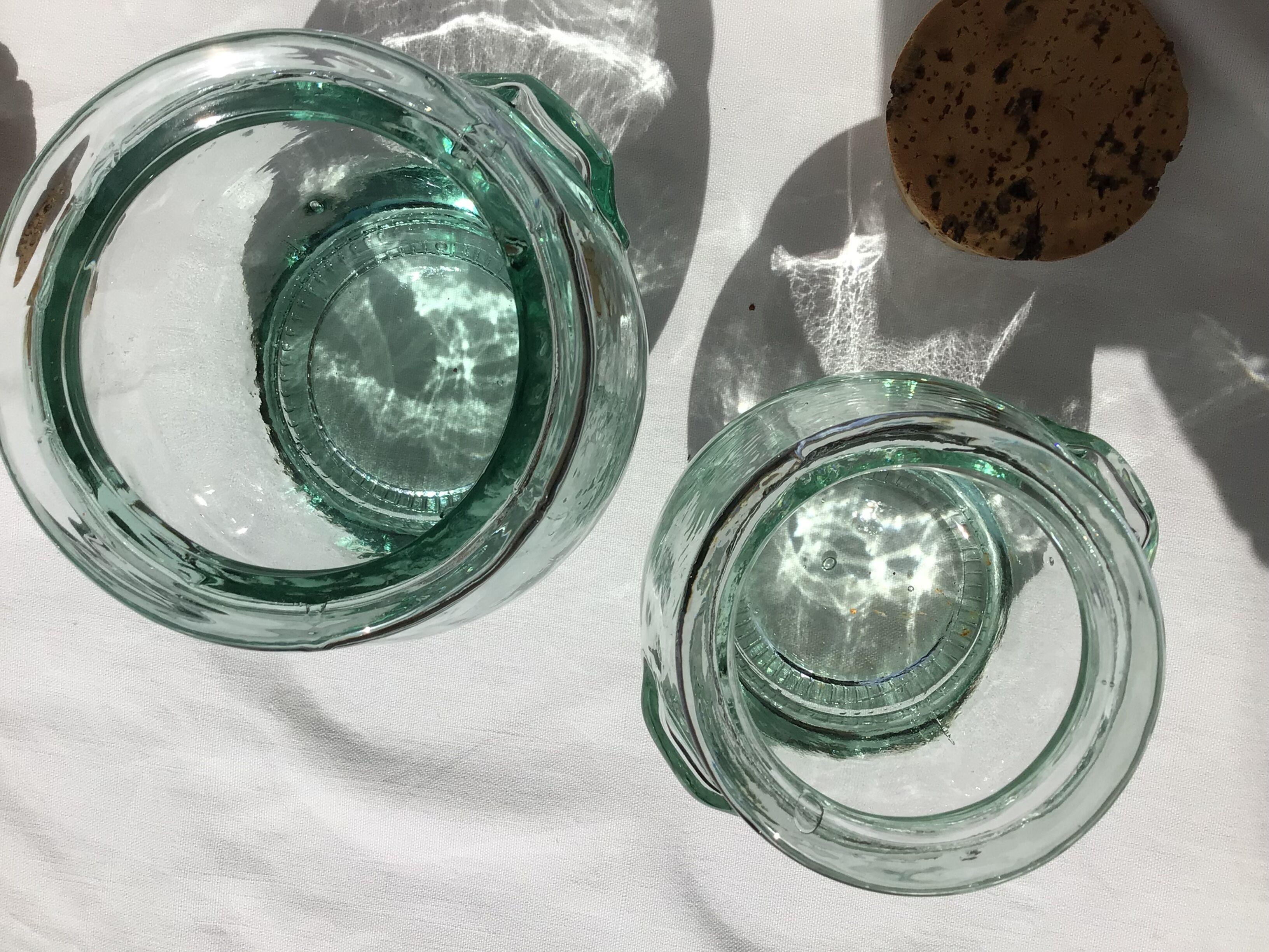 2 jars light green glass molded cork stopper