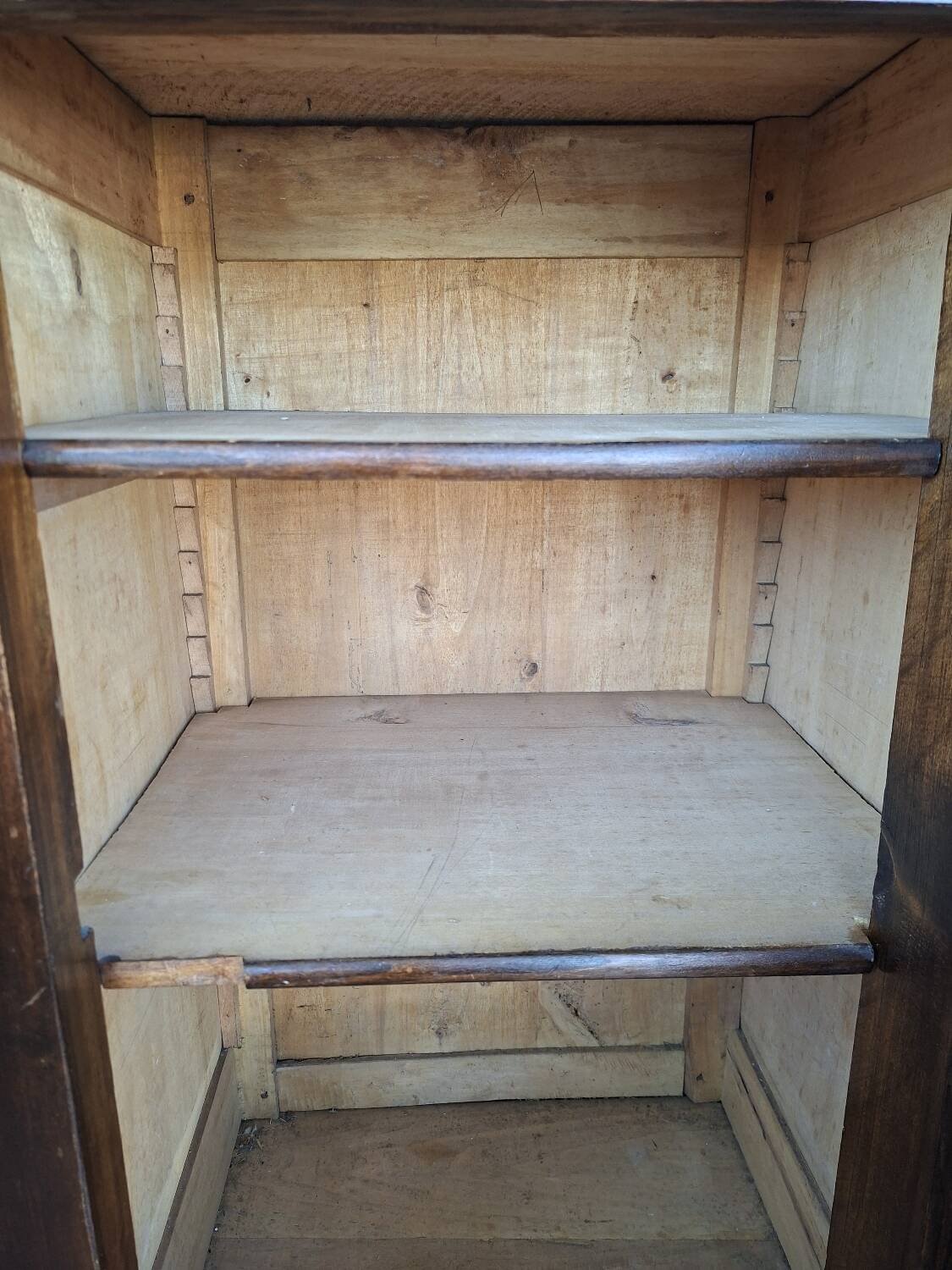 Small storage unit in solid wood and copper.