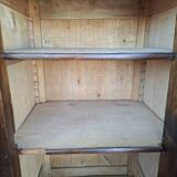 Small storage unit in solid wood and copper.