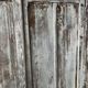 Large Parisian oak wardrobe from the early 20th century with an antique white patina