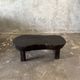 Small old Asian wooden coffee table in Japanese style, kidney-shaped top