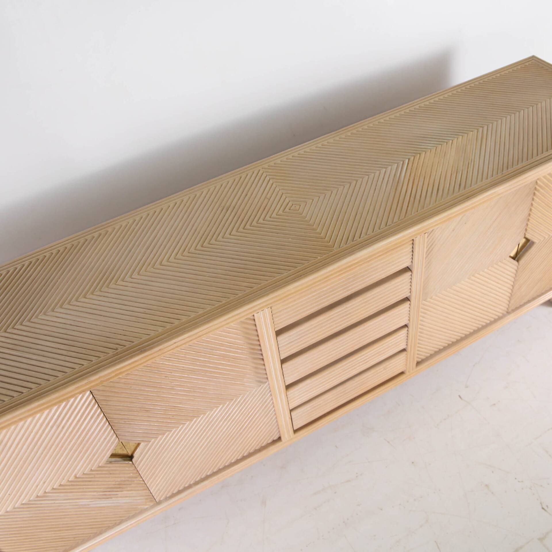 Rattan and brass sideboard