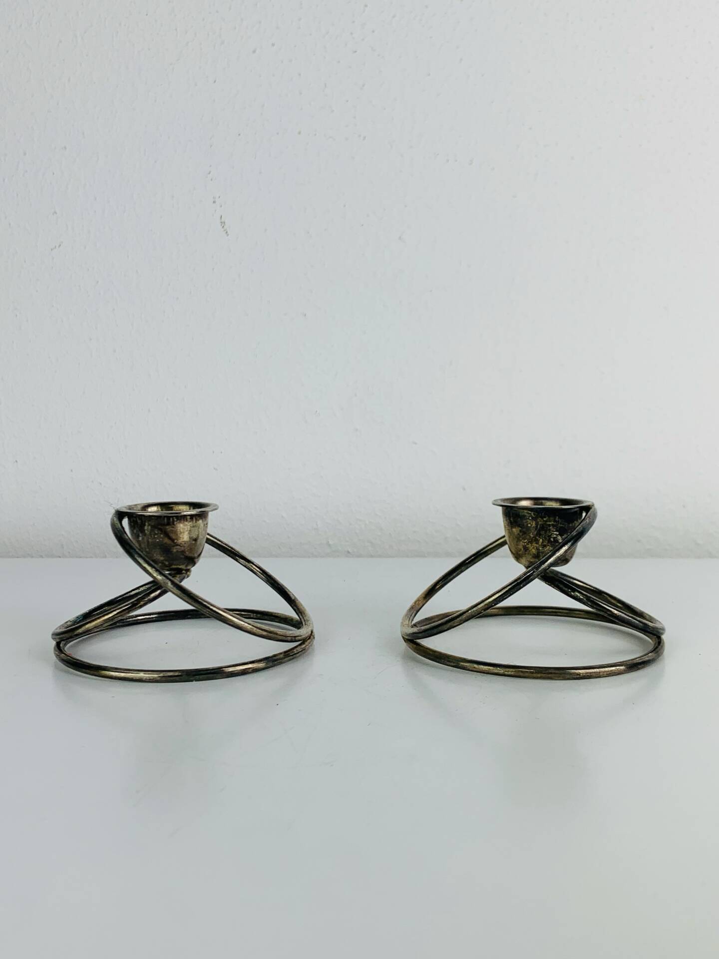 Pair of silver-plated metal candlesticks, vintage