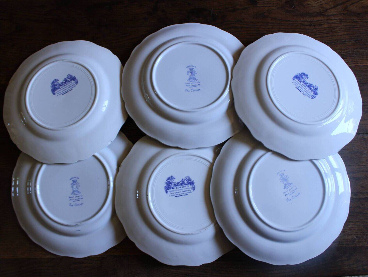 A set of 6 romantic blue Lunéville Sarreguemines flat plates.
