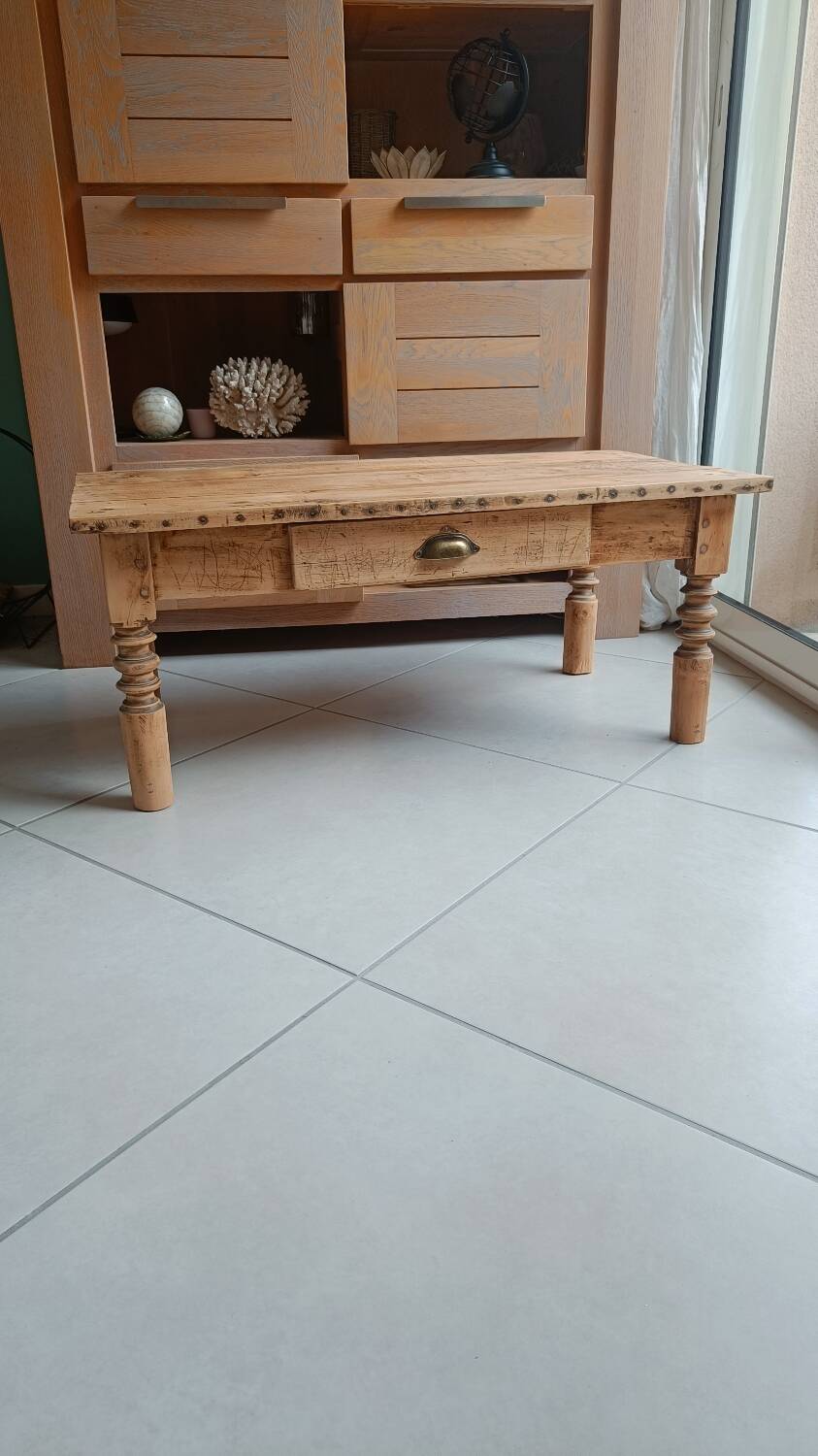Raw wood coffee table in a country style