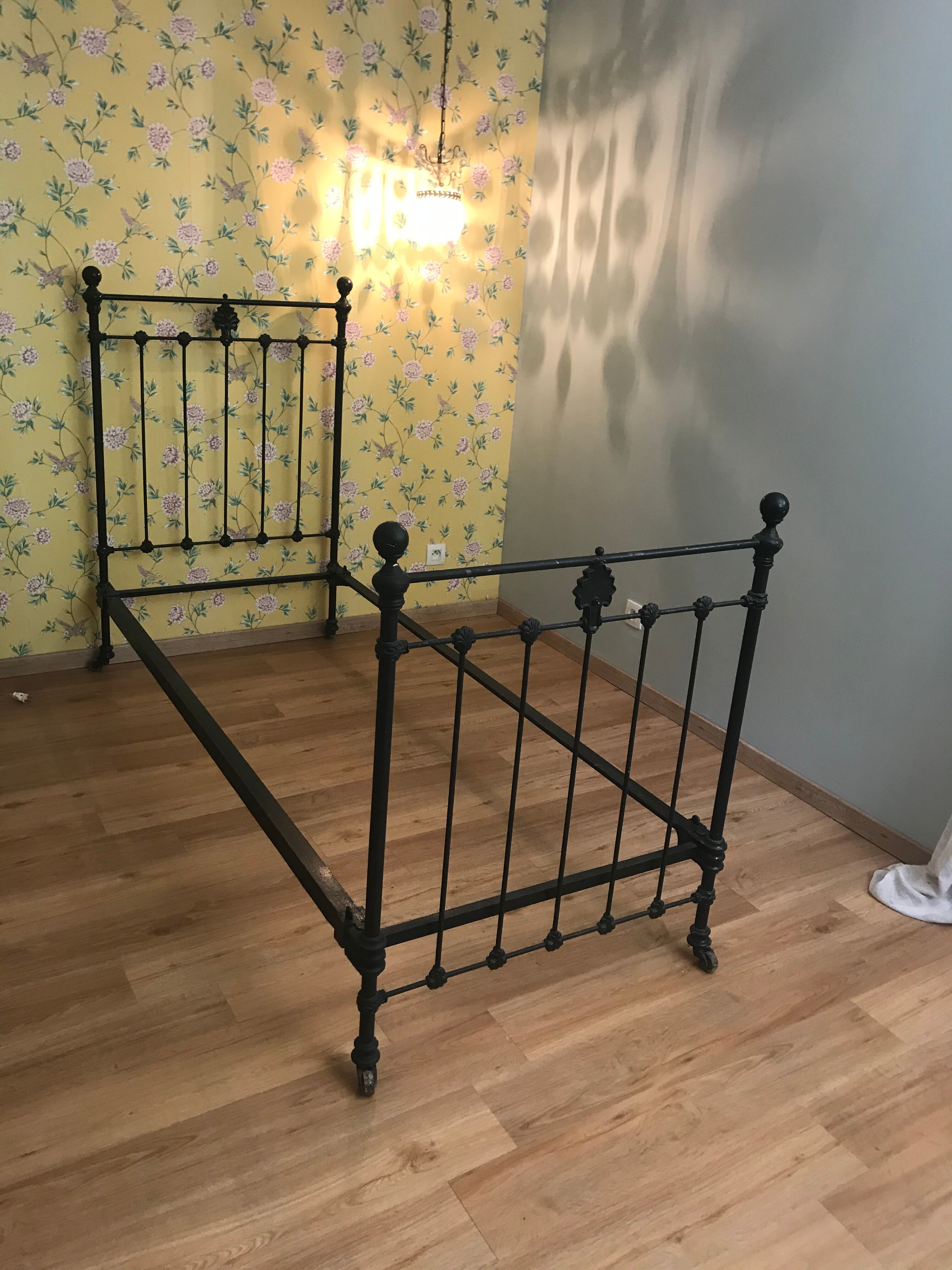Ancient wrought iron bed