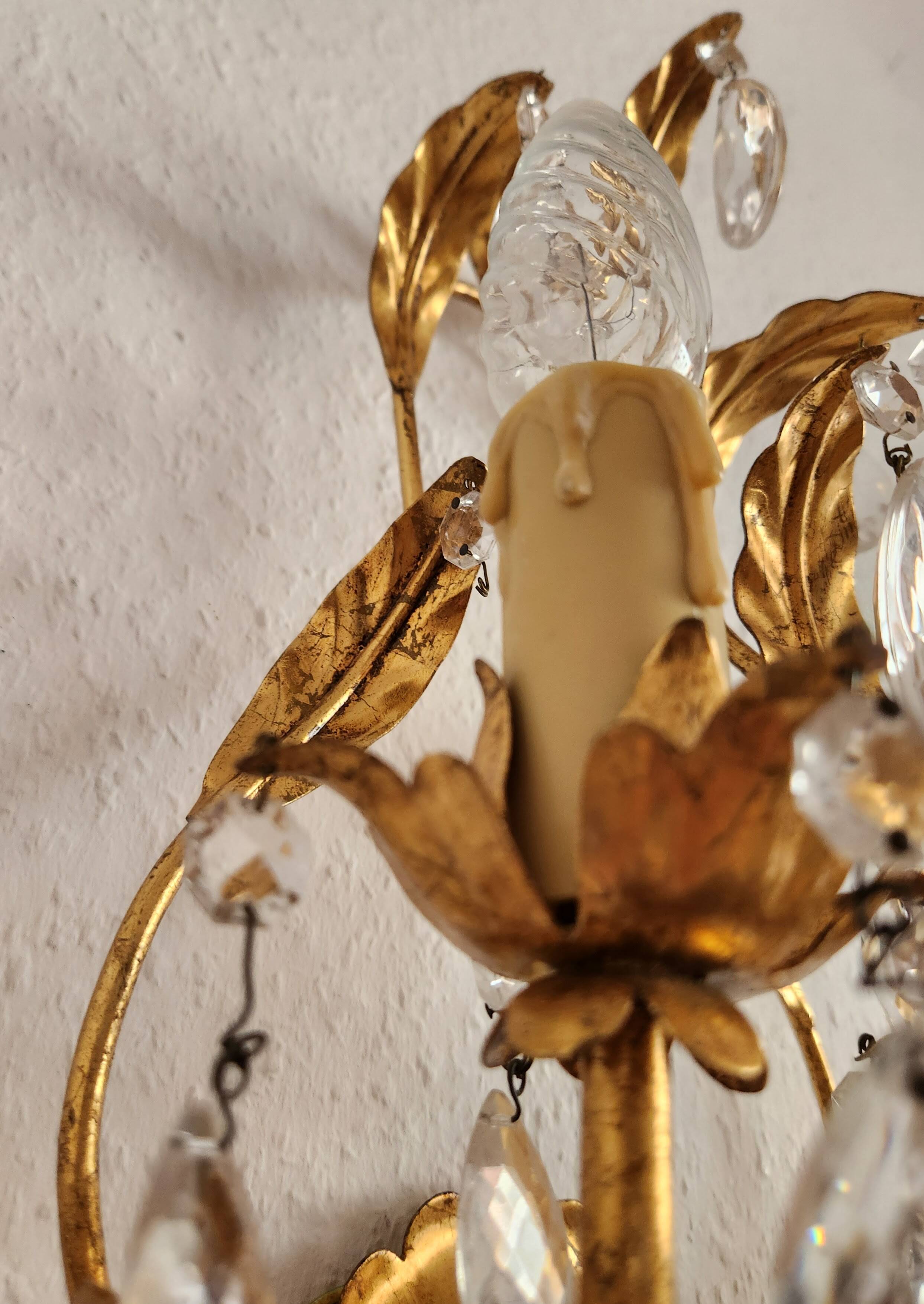 Hand-forged wall lamp gilded with gold leaf and crystals, Italy
