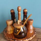 Oil, vinegar, mustard, pepper, salt, olive wood servant from Spain.