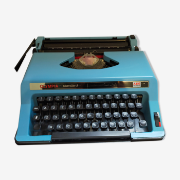 Vintage blue olympia typewriter from the 70s