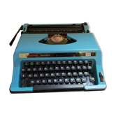 Vintage blue olympia typewriter from the 70s