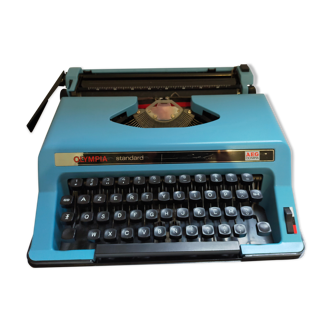 Vintage blue olympia typewriter from the 70s