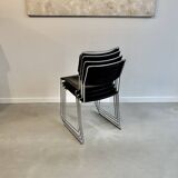 4 Spilimbergo chairs from Italy in chrome steel and black plastic.