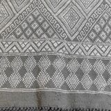 Handmade gray and white rug in natural wool