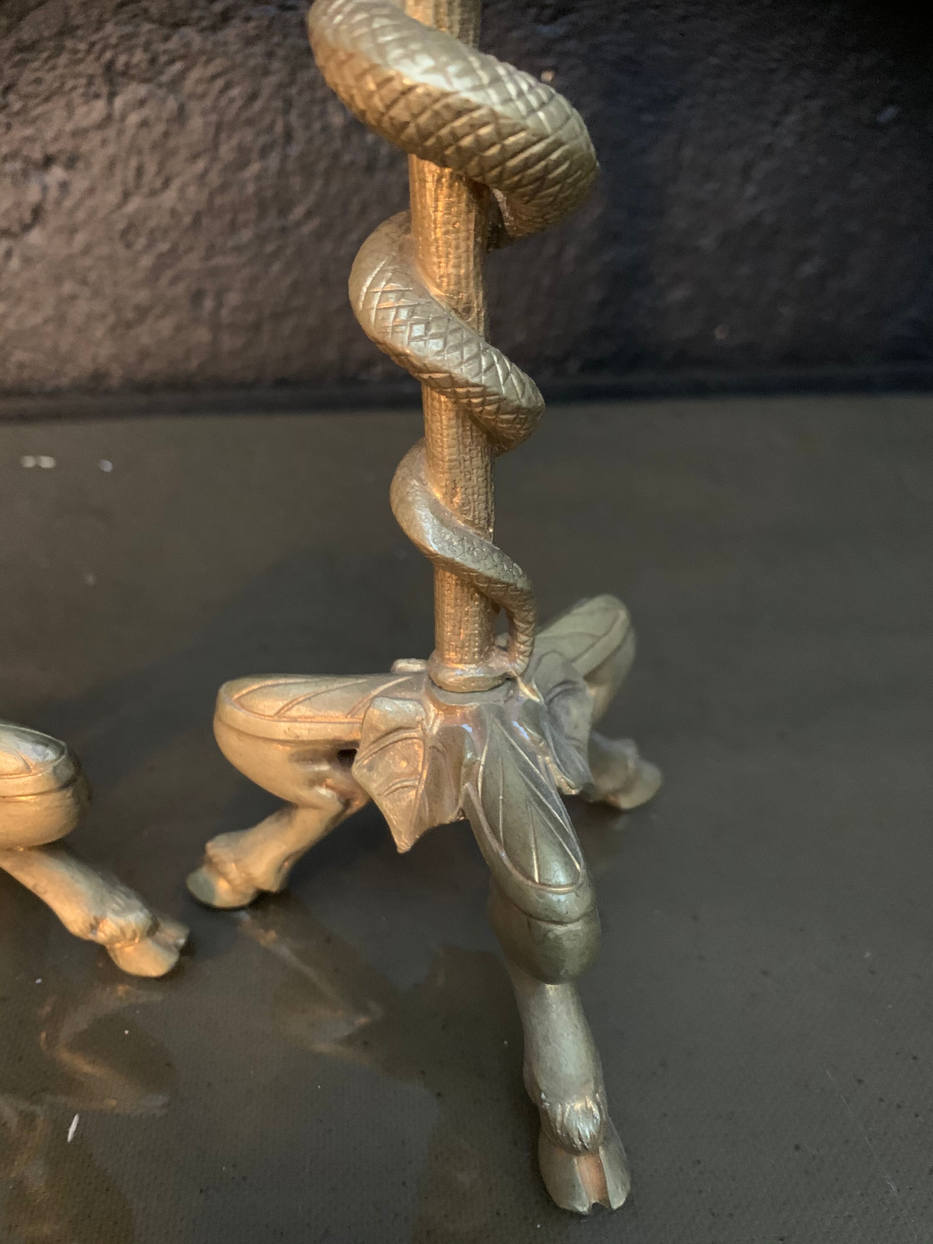 Pair of candlesticks with snakes, gilded bronze 19th century