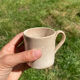 Duo of old beige Veillard Bordeaux coffee cups