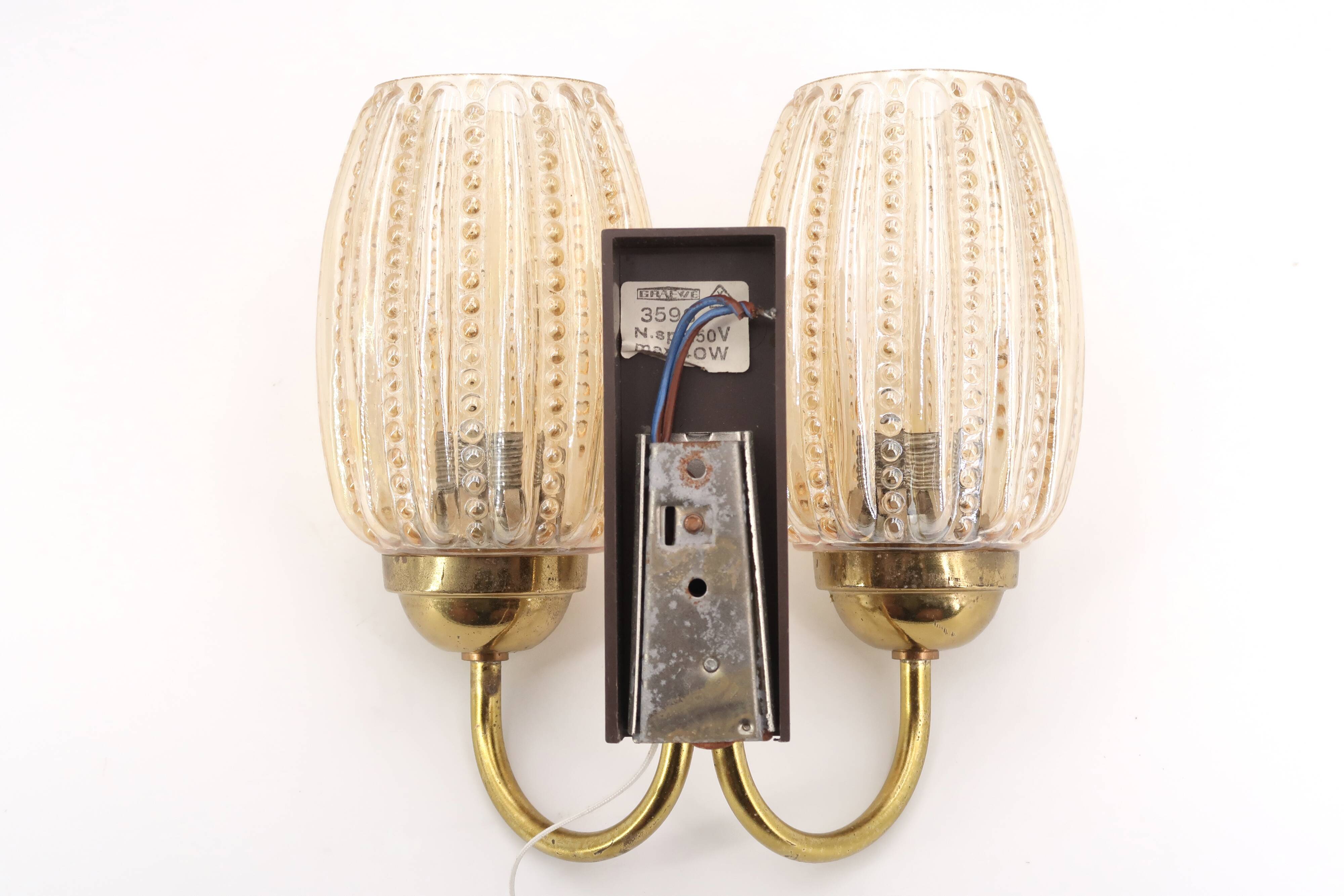 Pair of Graewe wall lights in brass and tinted glass, 1960s