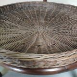 Vintage rattan coffee table with smoked glass top and rattan basket shelf