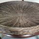 Vintage rattan coffee table with smoked glass top and rattan basket shelf