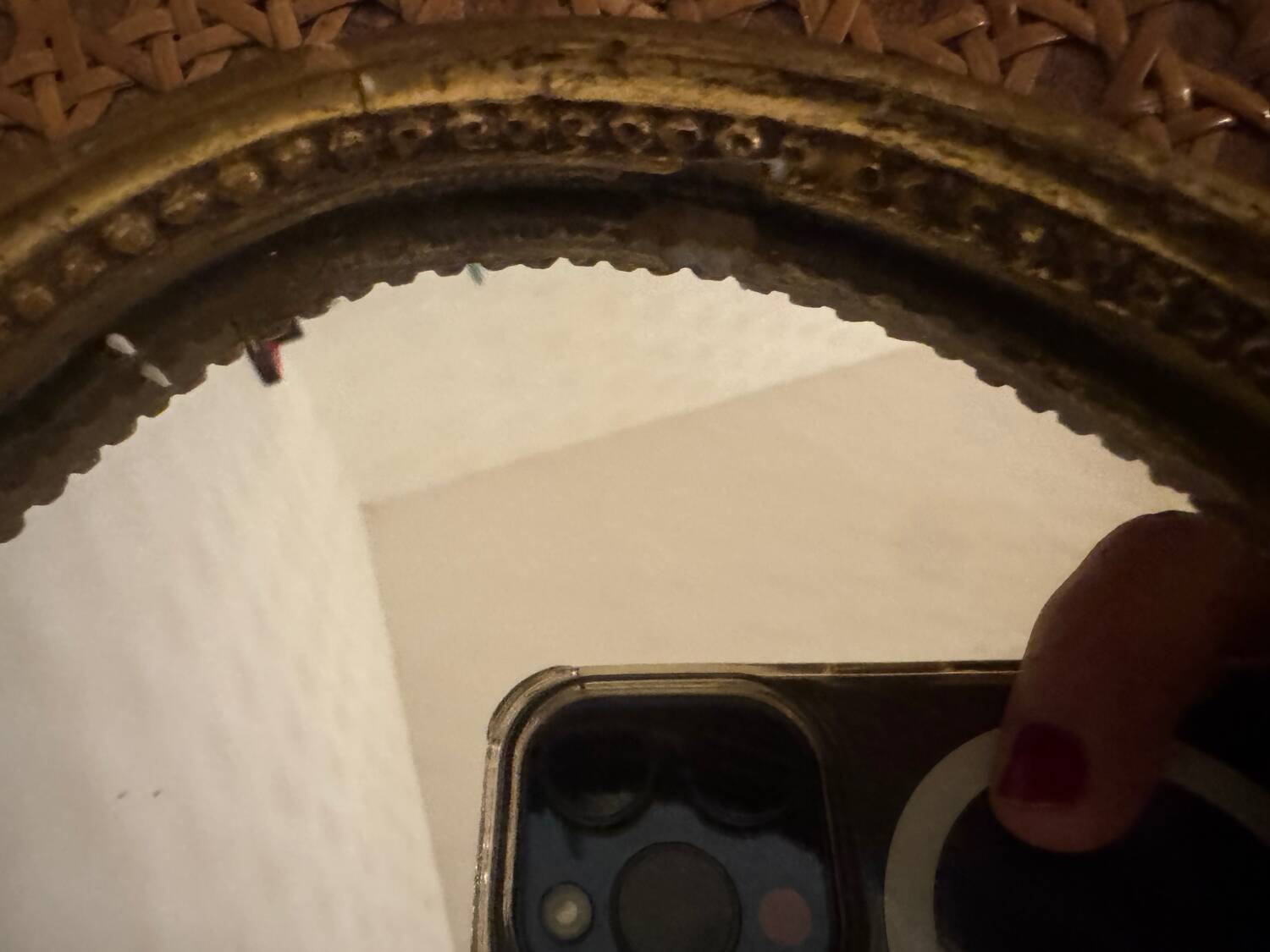 Oval gold knot mirror