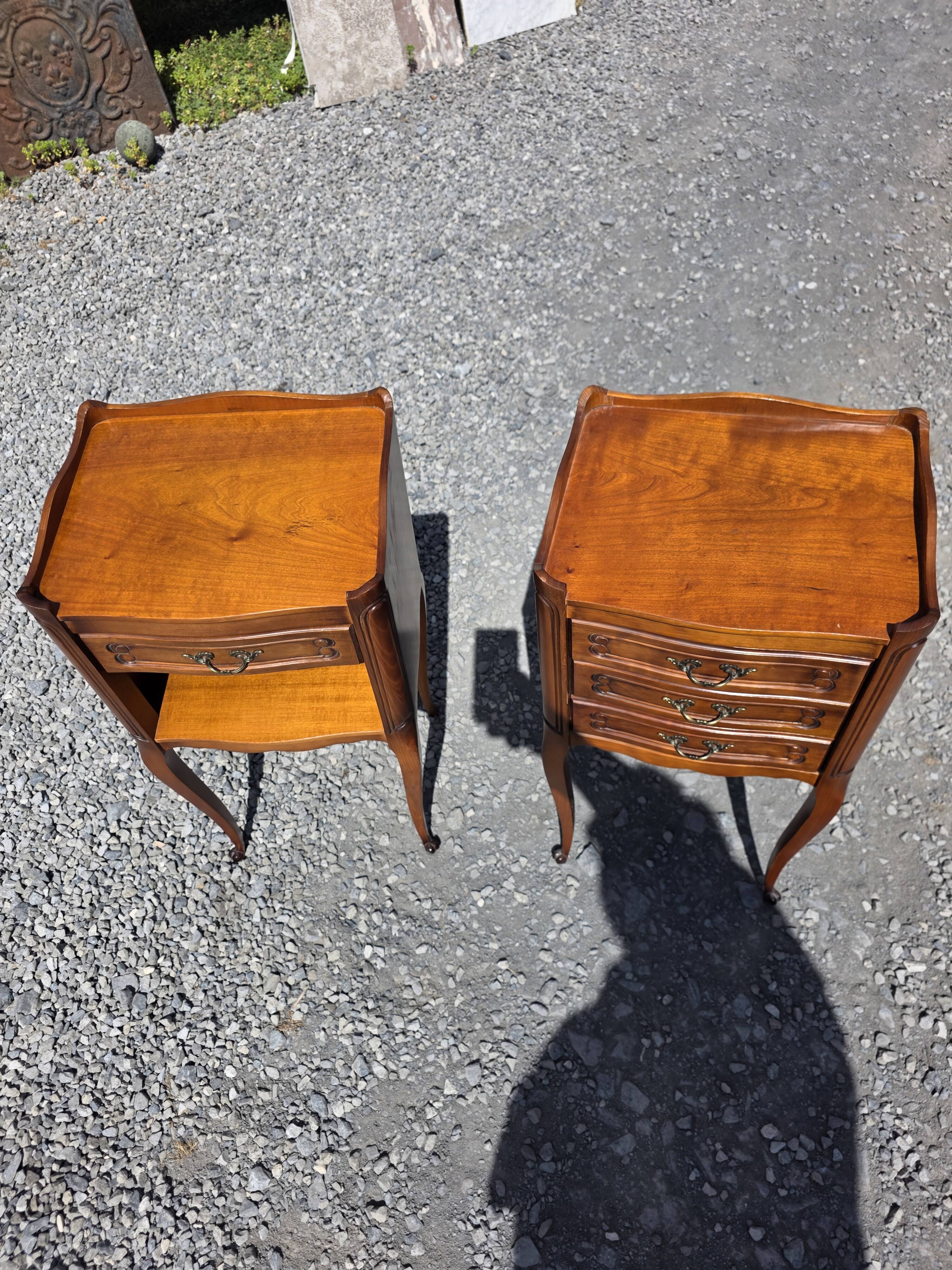 Pair of Louis XV style bedside tables in cherry wood.