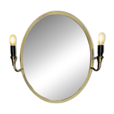 Oval wall mirror in gilded brass with double sconces – 1950s/60s