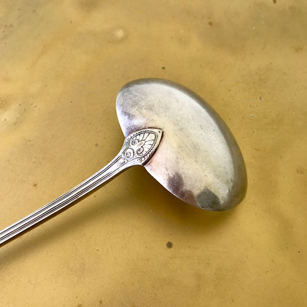 Silver metal ladle