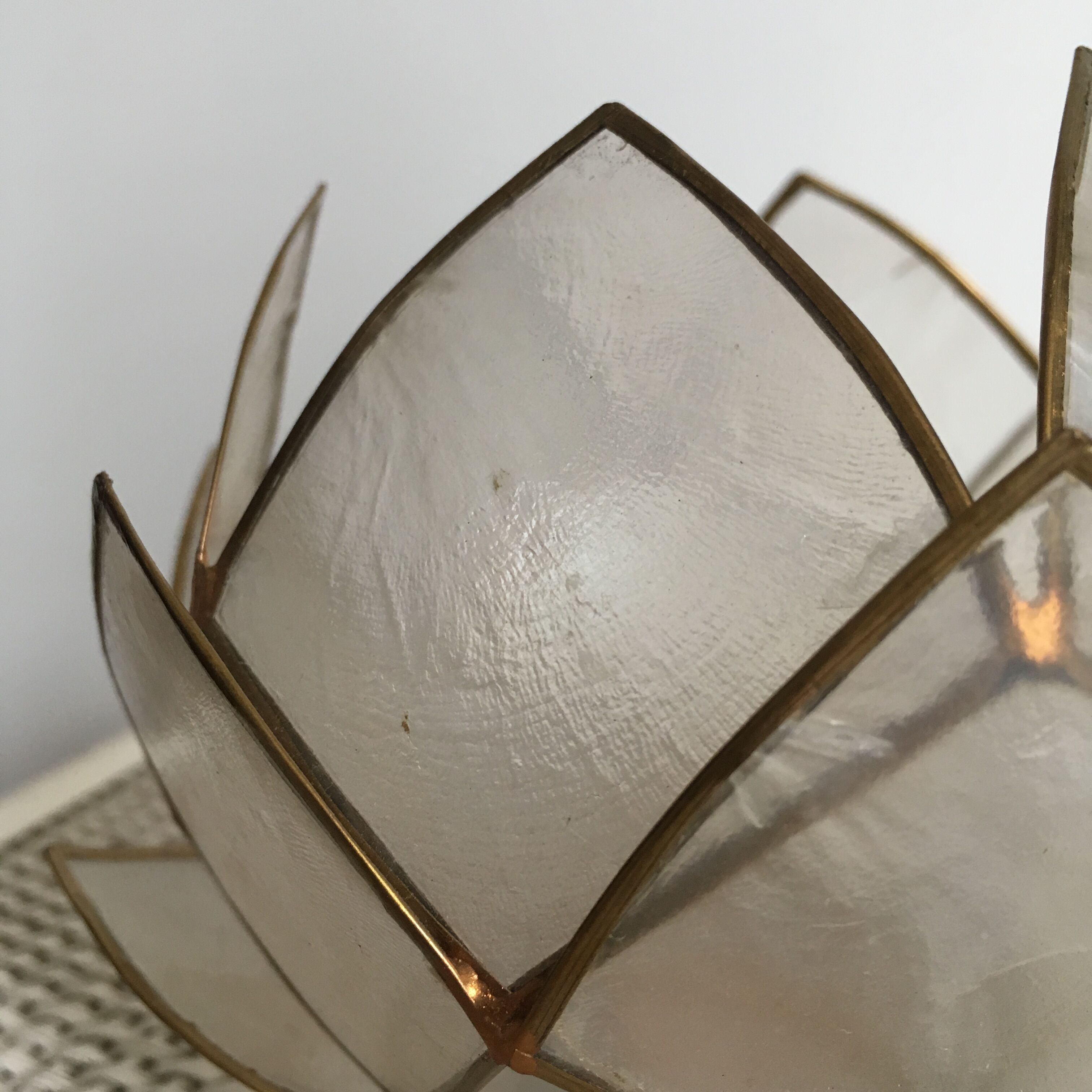 Candlestick or candle holder in nacre flower shape