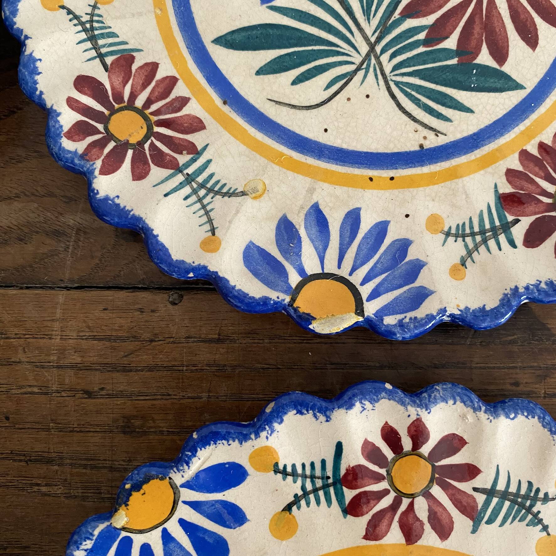 Henriot Quimper dessert plates, hand-painted earthenware.