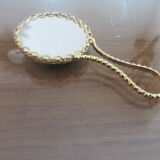 Handheld mirror in porcelain and gilded metal 50s 60s