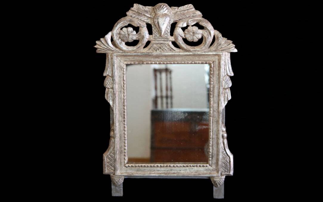 Small mirror, silver-leafed wood