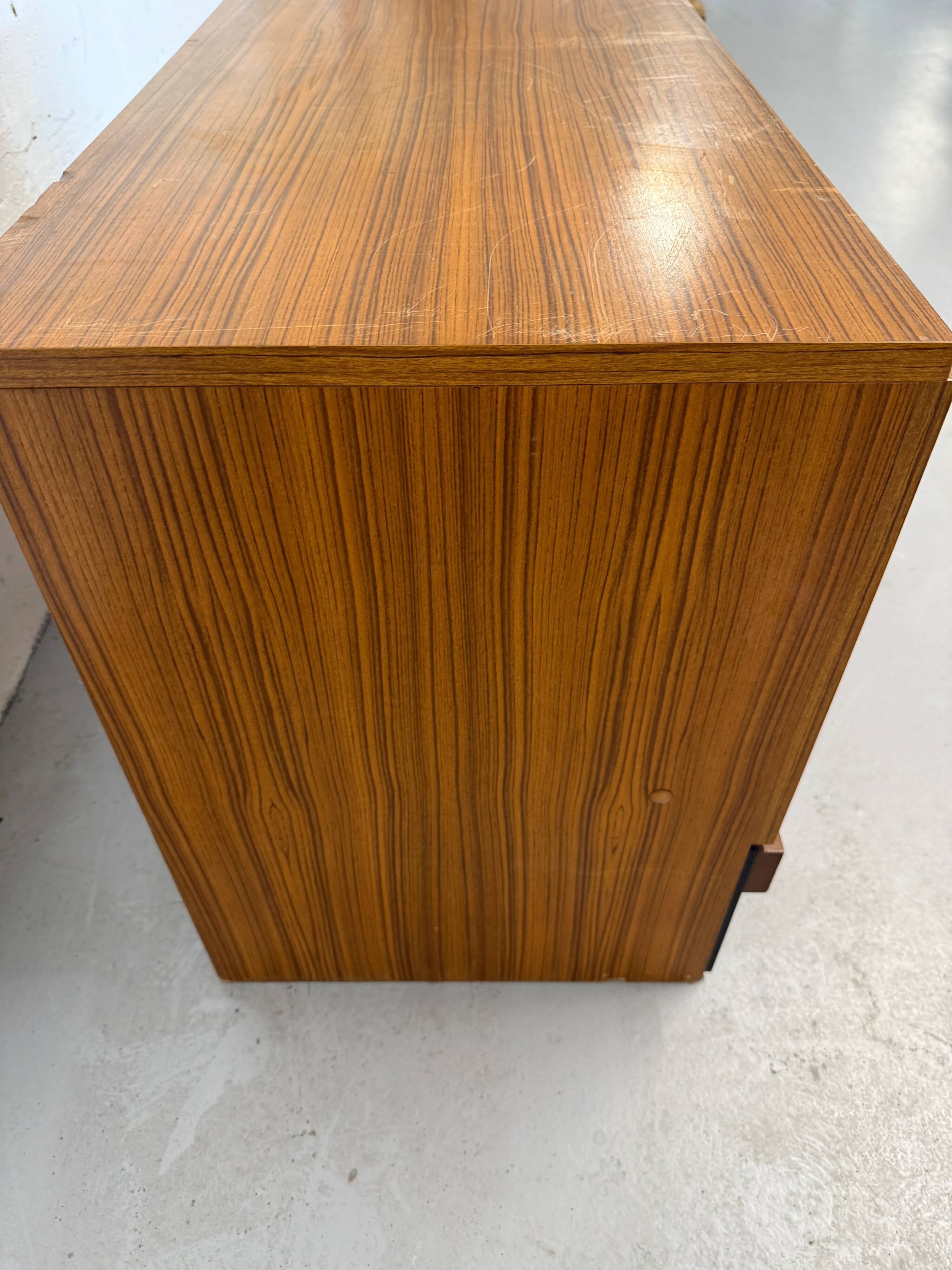 Vintage teak sideboard, mid-century style, with doors and drawers.