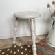 Patinated white tripod