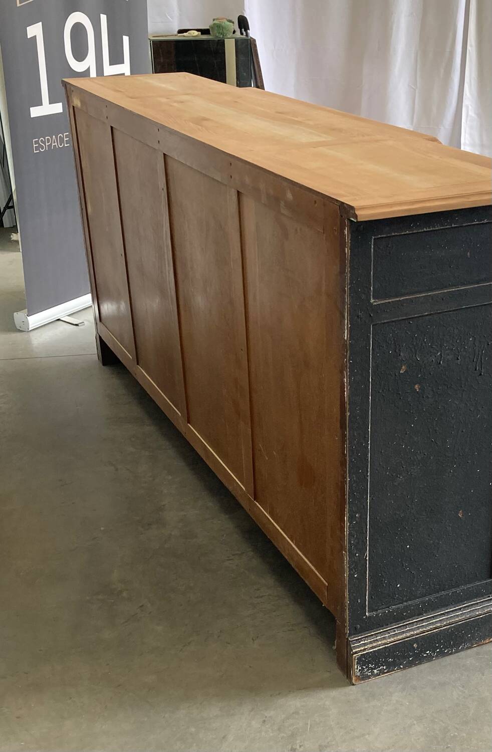 Old sideboard with four doors and four drawers