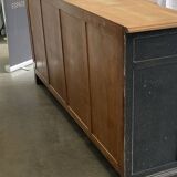 Old sideboard with four doors and four drawers