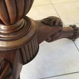 Wooden gueridon with marble, lion paw legs.