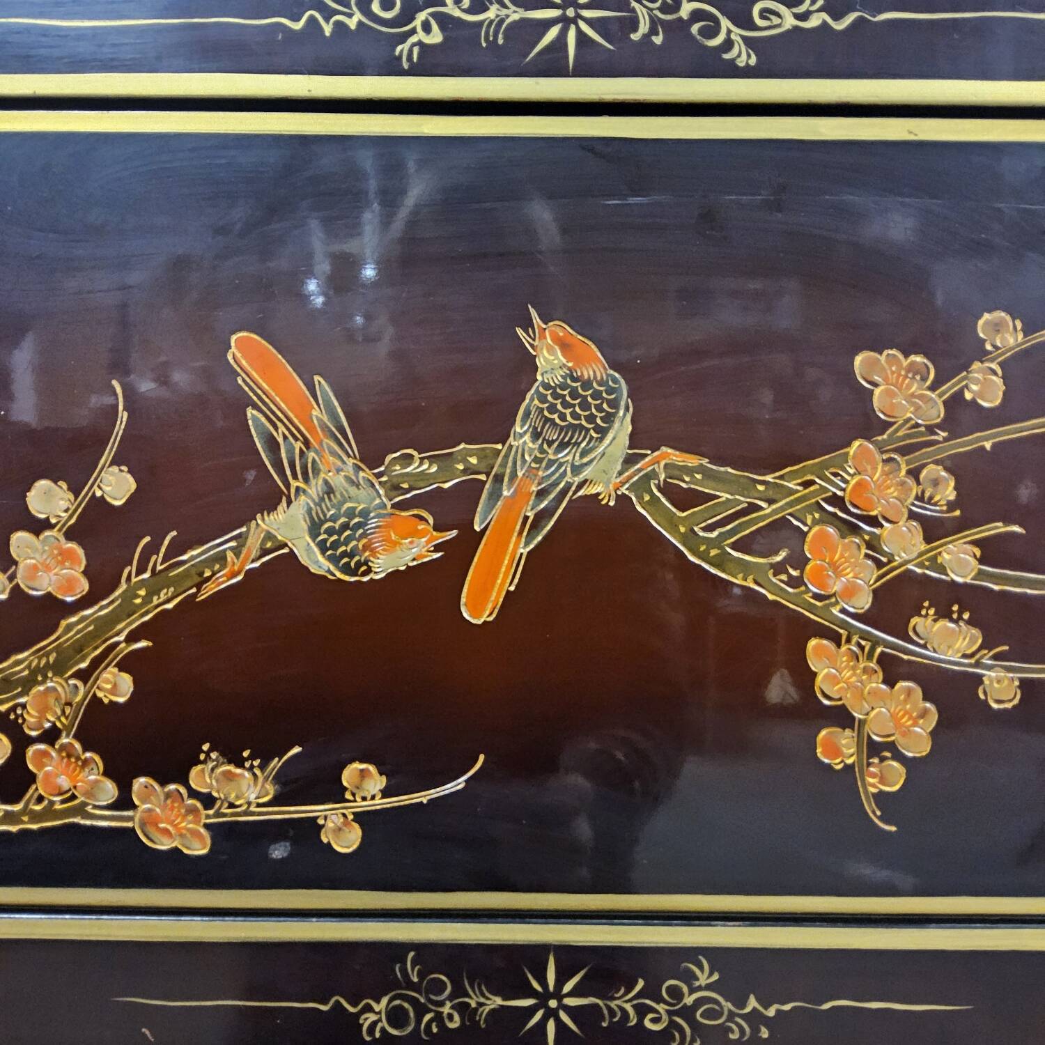 Vintage red / gold Chinese lacquer cabinet with flowers and birds
