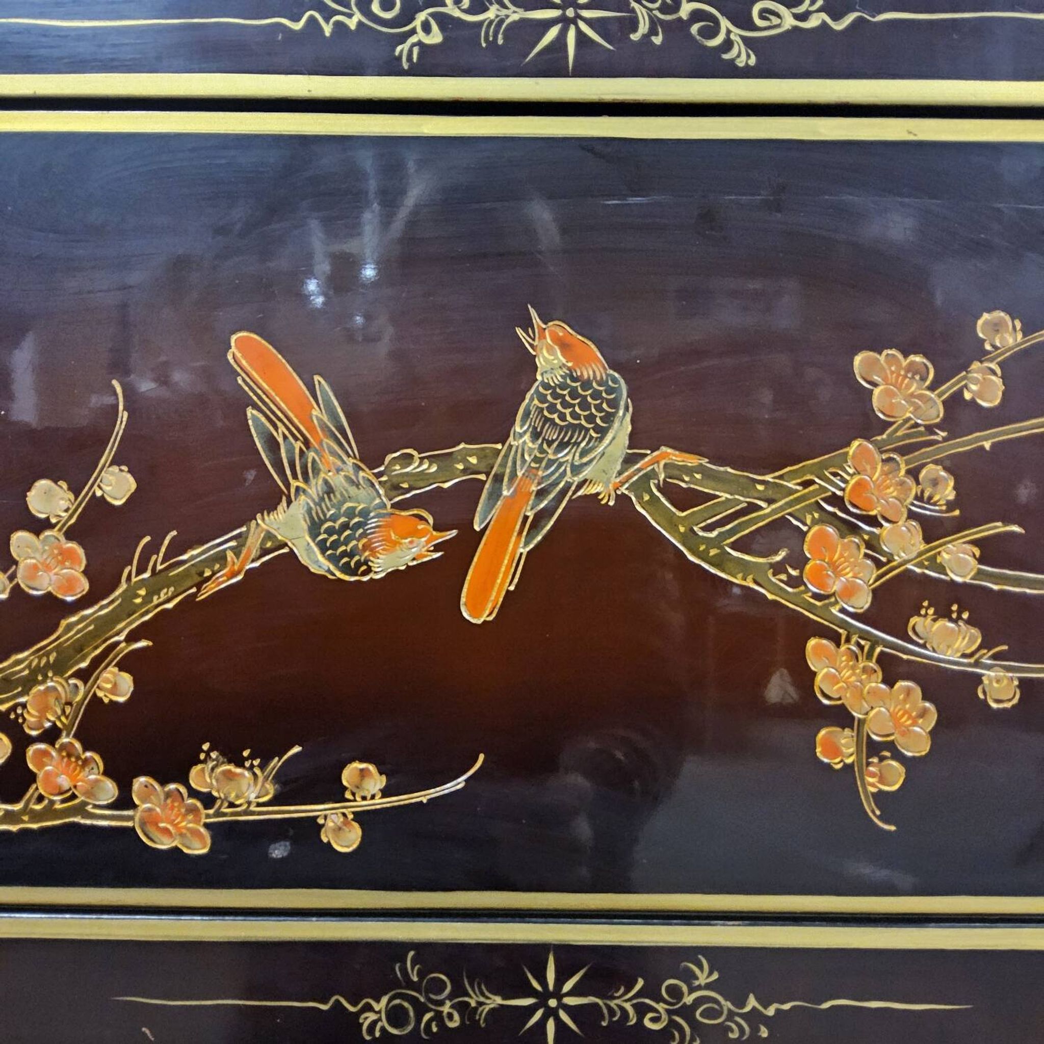 Vintage red / gold Chinese lacquer cabinet with flowers and birds