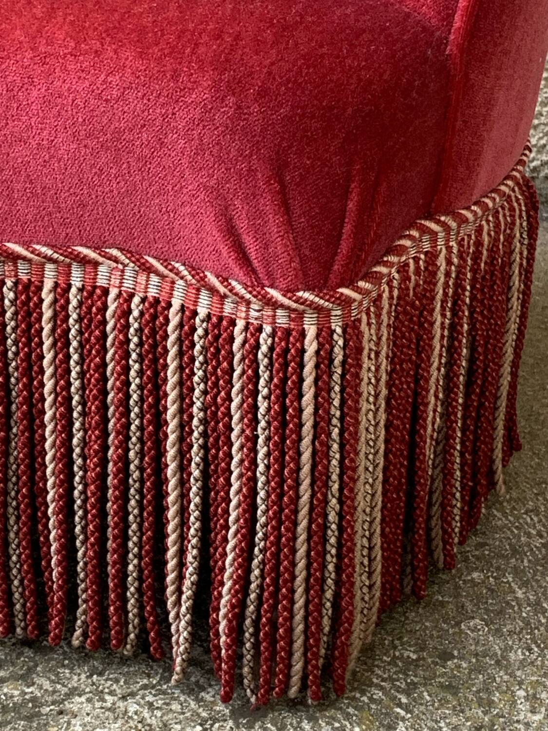 Old raspberry velvet toad armchair