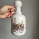 Porcelain carafe with antique decorations