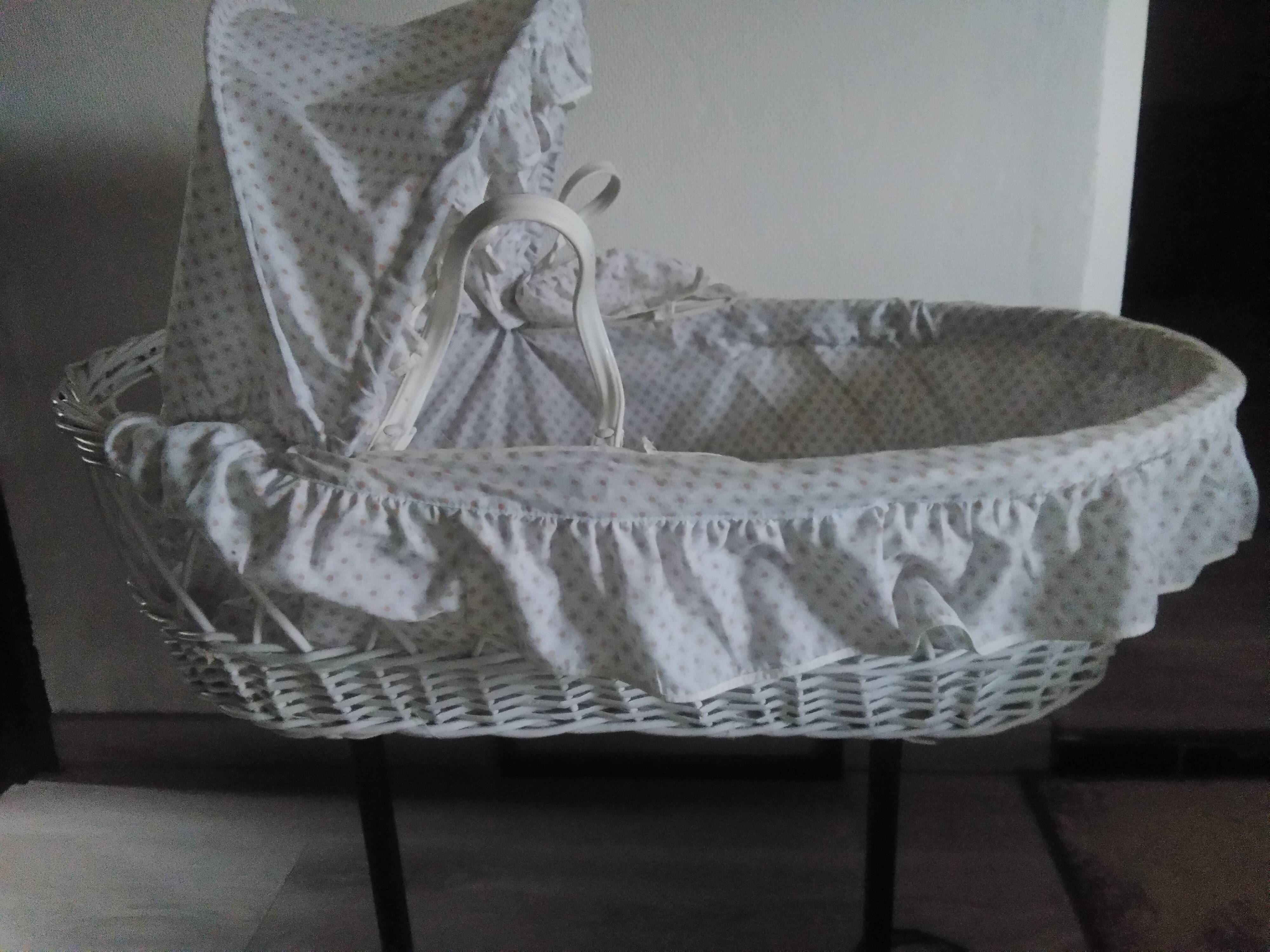 White rattan bassinet