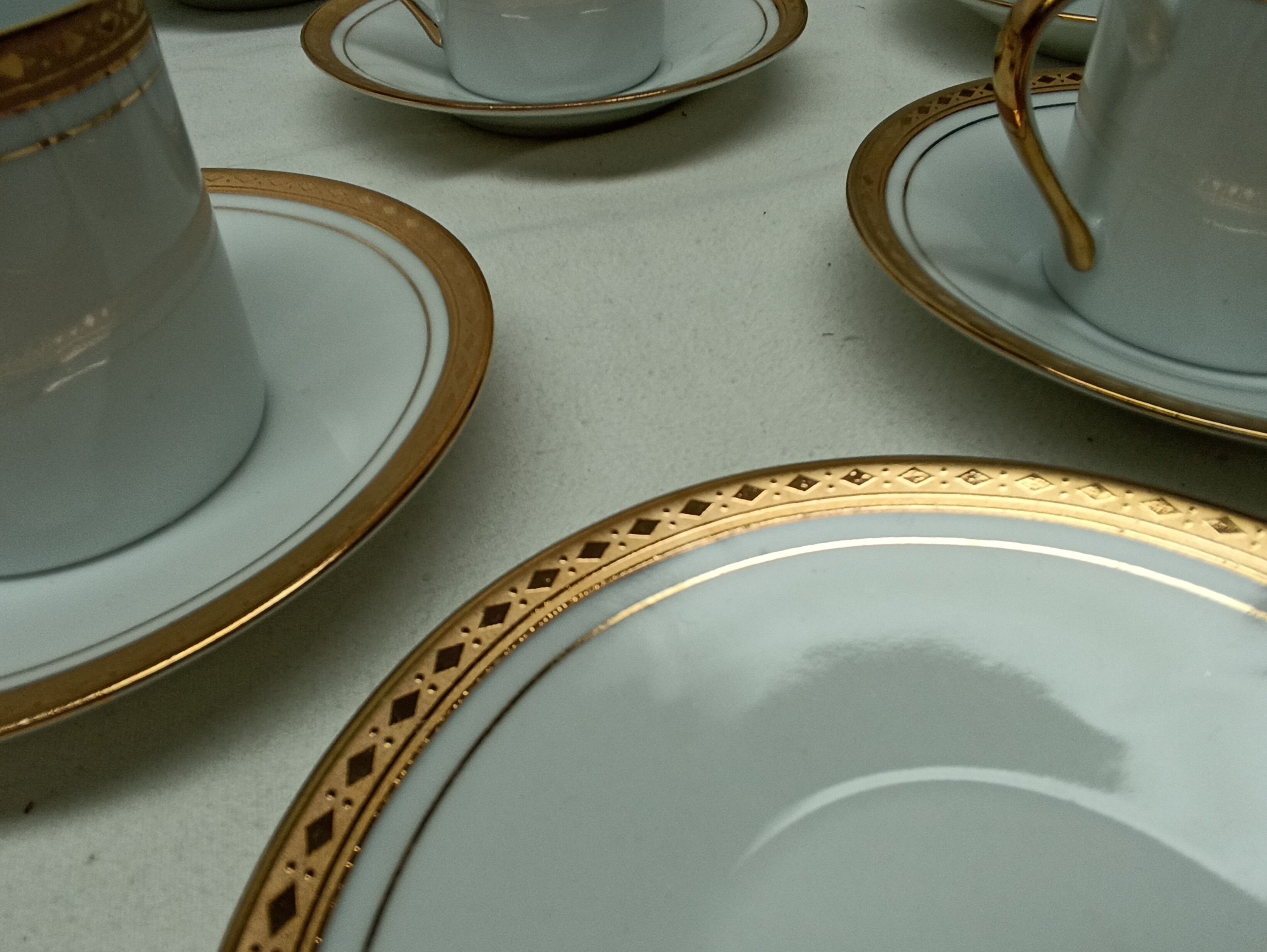 12 cups, porcelain coffee service with 24 carat gold gilding